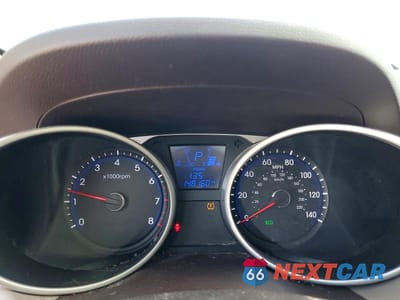 Zdjęcie 9 z 12 samochodu: 2013 HYUNDAI TUCSON LIMITED VIN:KM8JUCAC0DU622580 - miniatura