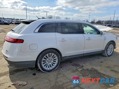 Trzecie zdjęcie samochodu z tyłu: 2012 LINCOLN MKT VIN:2LMHJ5AT3CBL52062 - miniatura