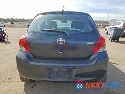 Zdjęcie 6 z 12 samochodu: 2009 TOYOTA YARIS BASE VIN:JTDKT903X95263644 - miniatura