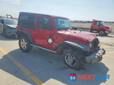 Czwarte zdjęcie samochodu z boku: 2011 JEEP WRANGLER SPORT VIN:1J4AA2D17BL588880 - miniatura