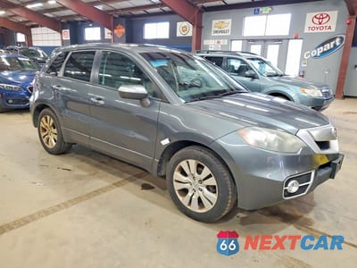 Czwarte zdjęcie samochodu z boku: 2010 ACURA RDX VIN:5J8TB1H27AA007088 - miniatura
