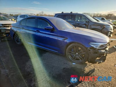 Czwarte zdjęcie samochodu z boku: 2019 BMW M5 VIN:WBSJF0C59KB447789 - miniatura