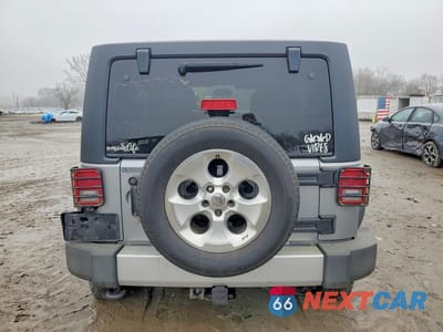 Zdjęcie 6 z 11 samochodu: 2013 JEEP WRANGLER UNLIMITED SAHARA VIN:1C4BJWEG9DL602625 - miniatura