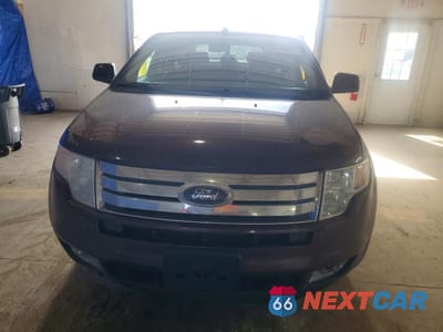 Piąte zdjęcie samochodu w środku: 2010 FORD EDGE SEL VIN:2FMDK3JC4ABA17191 - miniatura