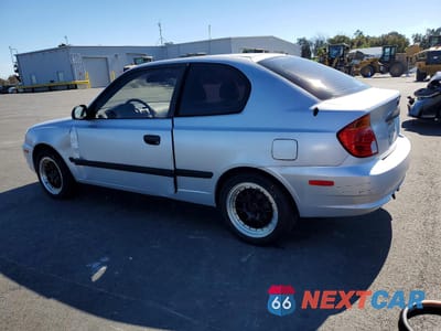 Drugie zdjęcie samochodu z przodu: 2003 HYUNDAI ACCENT BASE VIN:KMHCF35C13U260030 - miniatura