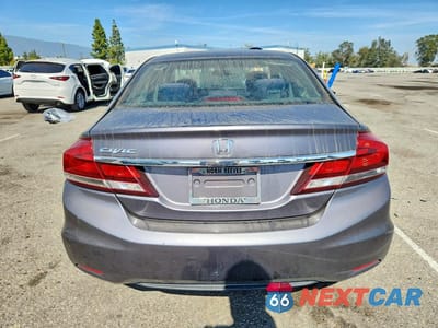 Zdjęcie 6 z 12 samochodu: 2015 HONDA CIVIC LX VIN:19XFB2F58FE262383 - miniatura