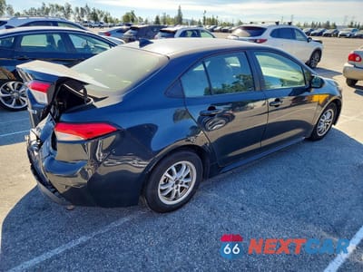 Trzecie zdjęcie samochodu z tyłu: 2022 TOYOTA COROLLA HYBRID LE VIN:JTDEAMDE2NJ044454 - miniatura