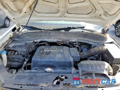 Zdjęcie 12 z 14 samochodu: 2008 HONDA RIDGELINE RTX VIN:2HJYK16348H509208 - miniatura