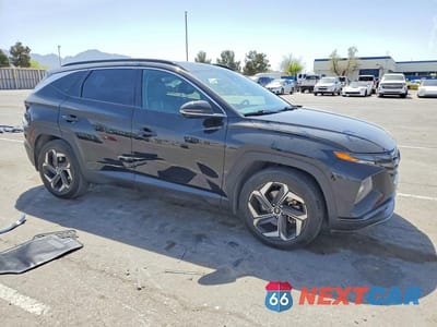 Czwarte zdjęcie samochodu z boku: 2022 HYUNDAI TUCSON LIMITED VIN:5NMJE3AE3NH105298 - miniatura