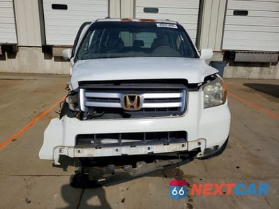 Piąte zdjęcie samochodu w środku: 2007 HONDA PILOT EXL VIN:5FNYF18597B030634 - miniatura