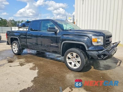 Czwarte zdjęcie samochodu z boku: 2015 GMC SIERRA K1500 SLE VIN:1GTV2UEC8FZ434133 - miniatura