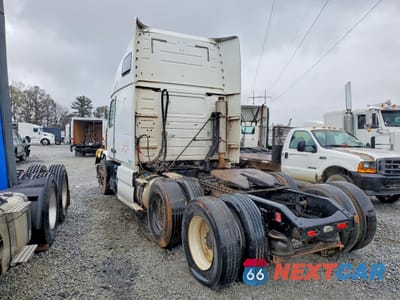 Trzecie zdjęcie samochodu z tyłu: 2012 VOLVO VN VNL VIN:4V4NC9EJ9CN548190 - miniatura