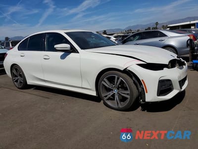 Czwarte zdjęcie samochodu z boku: 2021 BMW 330I VIN:3MW5R1J03M8B80776 - miniatura