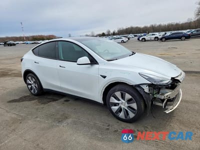 Czwarte zdjęcie samochodu z boku: 2023 TESLA MODEL Y VIN:7SAYGDEE8PA202249 - miniatura