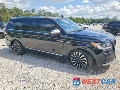 Czwarte zdjęcie samochodu z boku: 2023 LINCOLN NAVIGATOR BLACK LABEL VIN:5LMJJ2TG9PEL07646 - miniatura