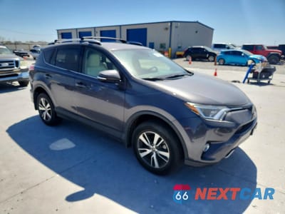 Czwarte zdjęcie samochodu z boku: 2018 TOYOTA RAV4 XLE VIN:JTMWFREV4JJ742026 - miniatura