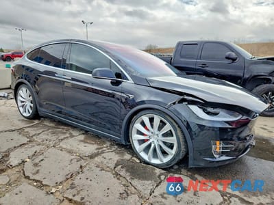 Czwarte zdjęcie samochodu z boku: 2017 TESLA MODEL X VIN:5YJXCBE40HF051766 - miniatura
