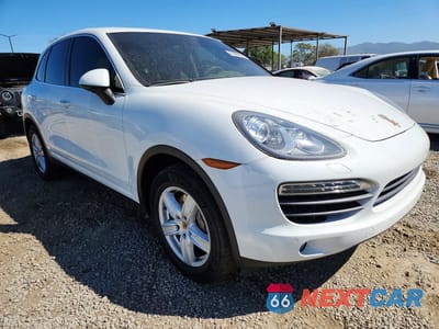 Czwarte zdjęcie samochodu z boku: 2013 PORSCHE CAYENNE S HYBRID VIN:WP1AE2A28DLA15379 - miniatura