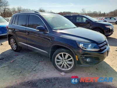 Czwarte zdjęcie samochodu z boku: 2013 VOLKSWAGEN TIGUAN S VIN:WVGBV3AX4DW565406 - miniatura