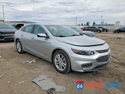 Czwarte zdjęcie samochodu z boku: 2017 CHEV MALIBU LT VIN:1G1ZE5ST4HF170456 - miniatura