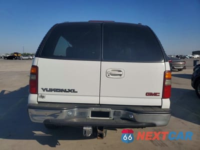Zdjęcie 6 z 13 samochodu: 2001 GMC YUKON XL C1500 VIN:1GKEC16T21J159607 - miniatura