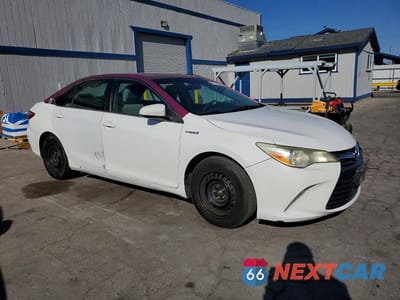 Czwarte zdjęcie samochodu z boku: 2016 TOYOTA CAMRY HYBRID LE VIN:4T1BD1FK1GU193298 - miniatura