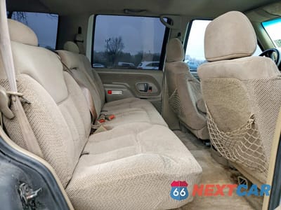 Zdjęcie 10 z 13 samochodu: 1999 GMC YUKON VIN:1GKEC13R9XJ755573 - miniatura