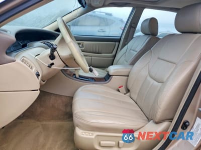 Zdjęcie 7 z 12 samochodu: 2001 TOYOTA AVALON XLS VIN:4T1BF28B61U164254 - miniatura