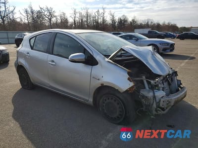 Czwarte zdjęcie samochodu z boku: 2013 TOYOTA PRIUS C TWO VIN:JTDKDTB34D1528209 - miniatura