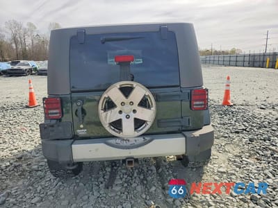 Zdjęcie 6 z 12 samochodu: 2010 JEEP WRANGLER SAHARA VIN:1J4AA5D19AL123176 - miniatura