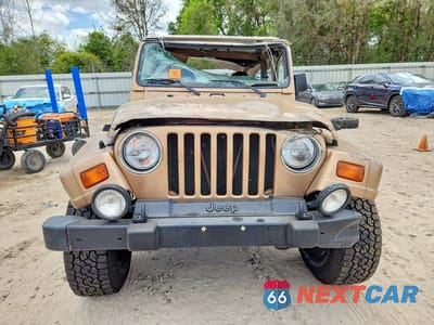 Piąte zdjęcie samochodu w środku: 1999 JEEP WRANGLER / TJ SAHARA VIN:1J4FY49S4XP450485 - miniatura