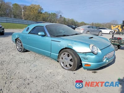 Czwarte zdjęcie samochodu z boku: 2002 FORD THUNDERBIRD VIN:1FAHP60A92Y110985 - miniatura