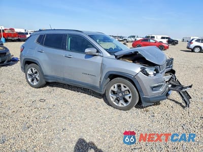 Czwarte zdjęcie samochodu z boku: 2019 JEEP COMPASS LIMITED VIN:3C4NJCCB1KT819462 - miniatura