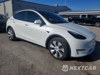 Czwarte zdjęcie samochodu z boku: 2023 TESLA MODEL Y VIN:7SAYGDED4PF966304 - miniatura