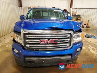 Piąte zdjęcie samochodu w środku: 2018 GMC CANYON SLE VIN:1GTG6CEN5J1117989 - miniatura