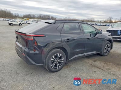 Trzecie zdjęcie samochodu z tyłu: 2023 TOYOTA BZ4X XLE VIN:JTMABACA1PA015295 - miniatura