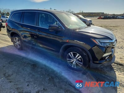 Czwarte zdjęcie samochodu z boku: 2017 HONDA PILOT EXLN VIN:5FNYF5H78HB000230 - miniatura