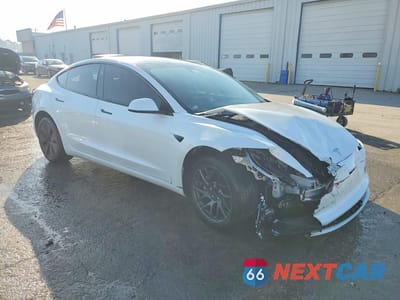 Czwarte zdjęcie samochodu z boku: 2024 TESLA MODEL 3 VIN:5YJ3E1EA5RF769467 - miniatura