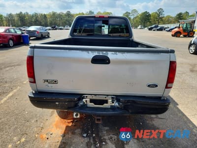 Zdjęcie 6 z 12 samochodu: 1999 FORD F150 VIN:1FTRX17L6XNB83989 - miniatura