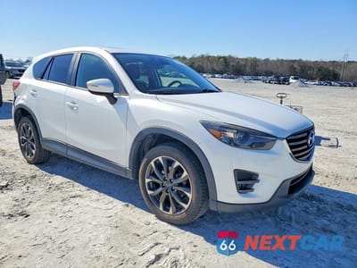 Czwarte zdjęcie samochodu z boku: 2016 MAZDA CX-5 GT VIN:JM3KE4DY9G0640646 - miniatura