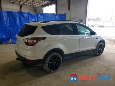 Trzecie zdjęcie samochodu z tyłu: 2017 FORD ESCAPE SE VIN:1FMCU9G93HUA98547 - miniatura