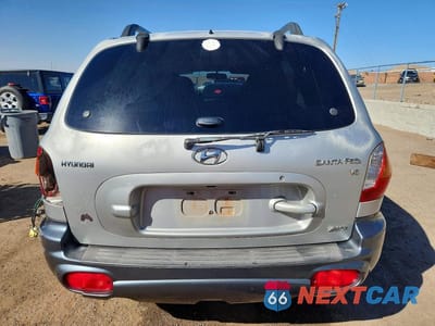 Zdjęcie 6 z 12 samochodu: 2002 HYUNDAI SANTA FE GLS VIN:KM8SC73D72U243965 - miniatura