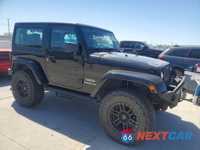 Czwarte zdjęcie samochodu z boku: 2010 JEEP WRANGLER SPORT VIN:1J4AA2D18AL228631 - miniatura