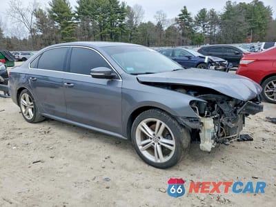 Czwarte zdjęcie samochodu z boku: 2015 VOLKSWAGEN PASSAT SE VIN:1VWBV7A32FC093961 - miniatura