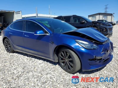 Czwarte zdjęcie samochodu z boku: 2020 TESLA MODEL 3 VIN:5YJ3E1EB4LF807156 - miniatura