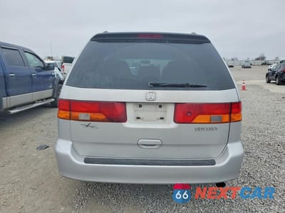 Zdjęcie 6 z 13 samochodu: 2002 HONDA ODYSSEY EXL VIN:2HKRL18952H515783 - miniatura