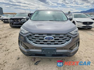 Piąte zdjęcie samochodu w środku: 2021 FORD EDGE TITANIUM VIN:2FMPK4K94MBA26919 - miniatura