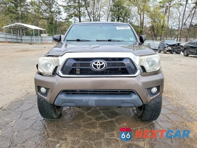 Piąte zdjęcie samochodu w środku: 2013 TOYOTA TACOMA V6 VIN:5TFUU4EN2DX076544 - miniatura