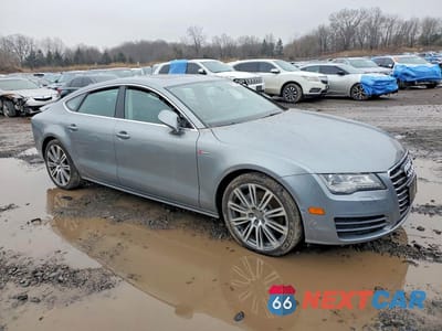 Czwarte zdjęcie samochodu z boku: 2014 AUDI A7 PREMIUM PLUS VIN:WAUWGAFCXEN022592 - miniatura
