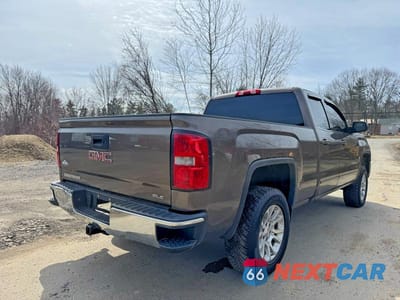 Czwarte zdjęcie samochodu z boku: 2014 GMC SIERRA K1500 SLE VIN:1GTV2UEC2EZ413101 - miniatura
